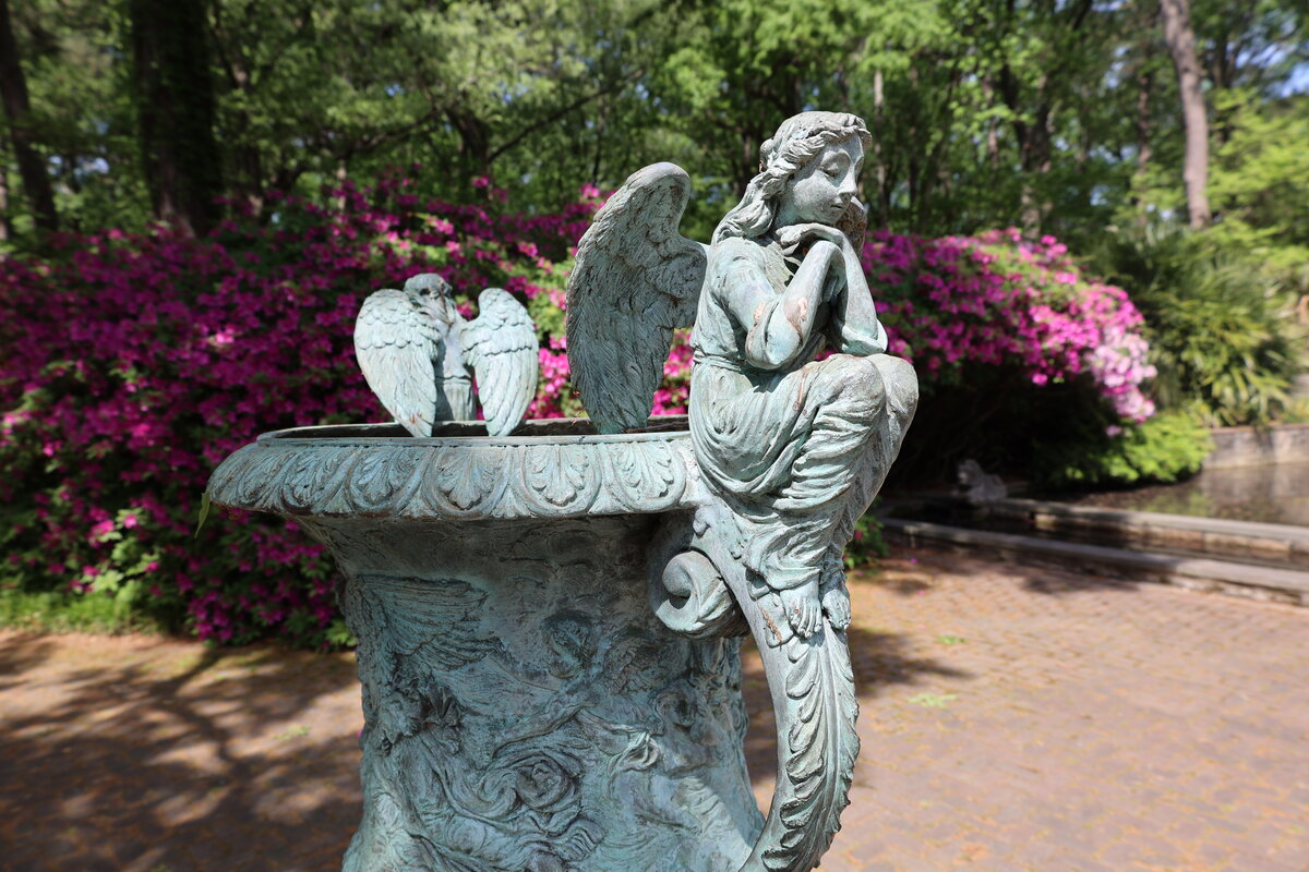 Angel fountain with azaleas